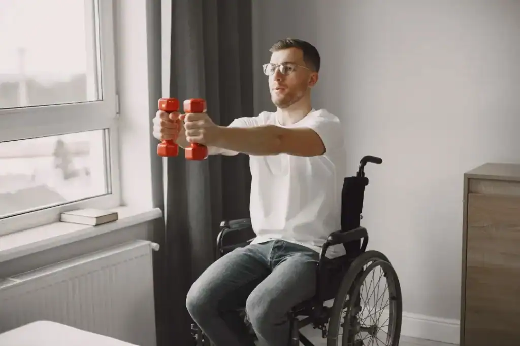 Empowering Weight Loss: A Comprehensive Guide for Individuals with Disabilities 1 Image of man doing exercise in his wheelchair to aid weight loss Llanelli