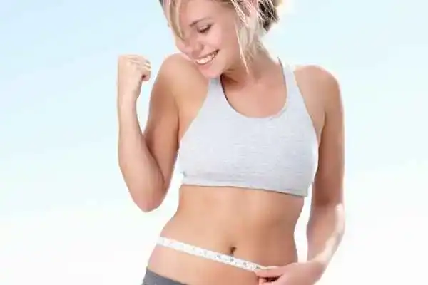Unraveling the Mystery: Where Does the Body Fat Loss From First? 3 Image of woman happy with fat loss Llanelli