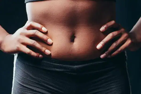 Toning Your Stomach: The Ultimate Guide to Achieving a Sculpted Stomach While Shedding Pounds 1 Image of a toned stomach after non surgical treatment Llanelli
